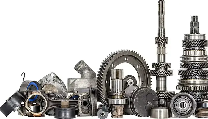 Assortment of used automotive parts.