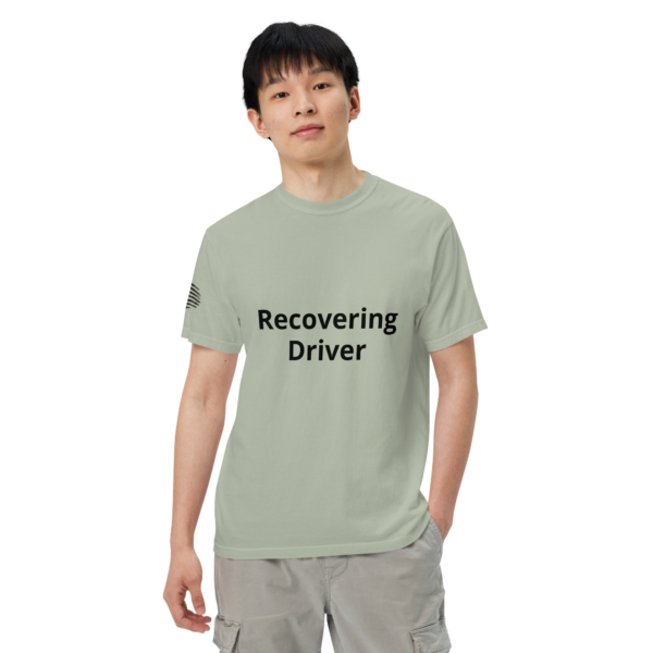 Man wearing a "recovering driver" t-shirt.