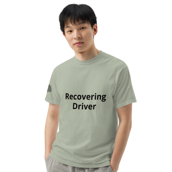 Man wearing a green shirt that says "recovering driver"