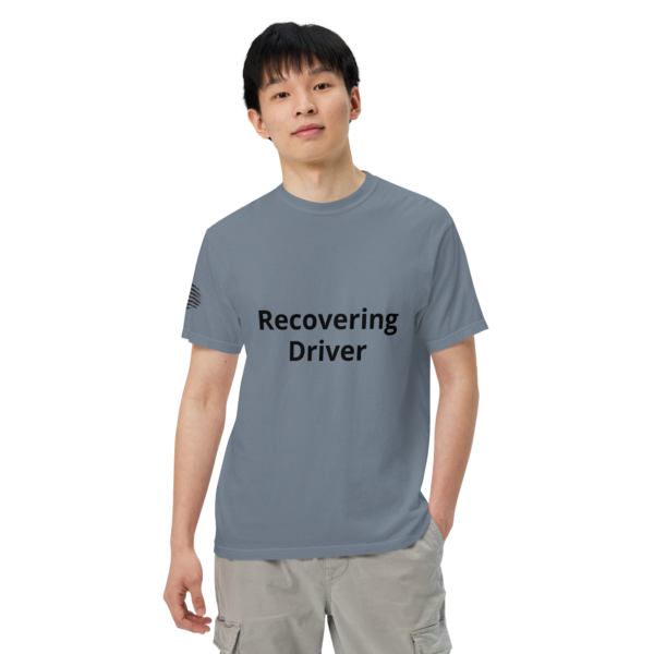 Man wearing a blue "recovering driver" shirt.