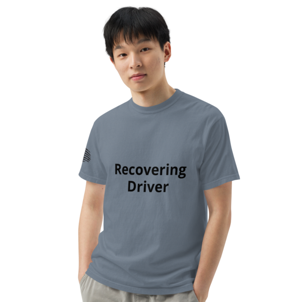 Man wearing a blue shirt that says "recovering driver"