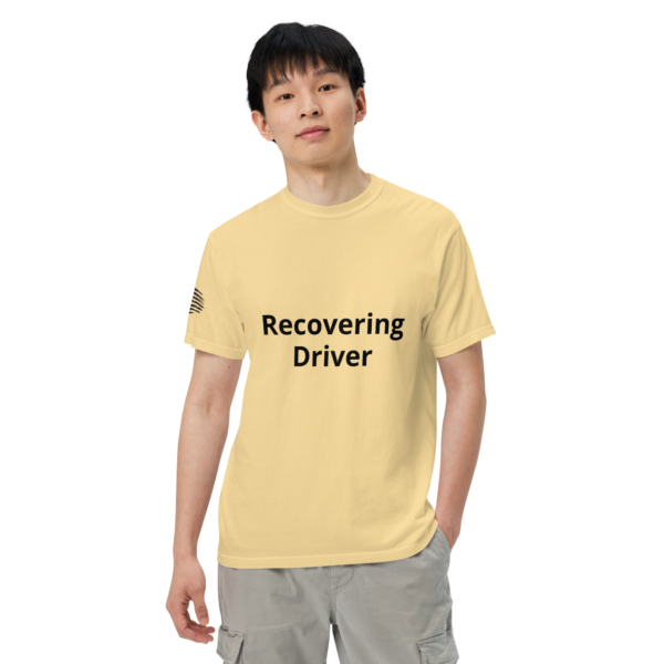 Man wearing a yellow "recovering driver" shirt.