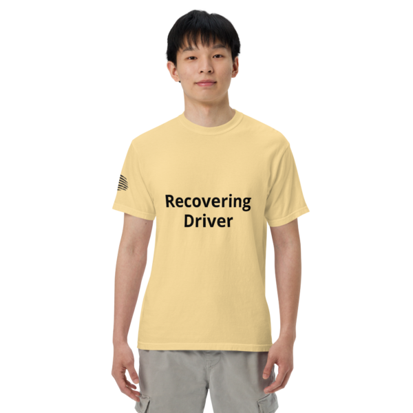 Man wearing a "Recovering Driver" t-shirt.