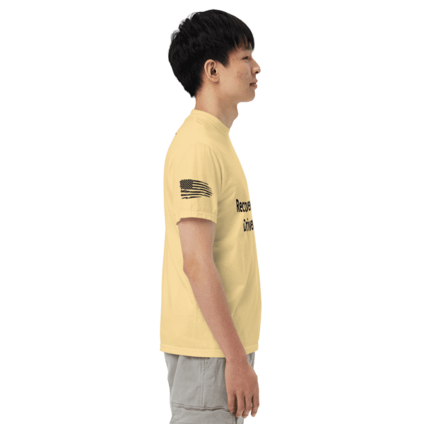 Man wearing yellow t-shirt with American flag.