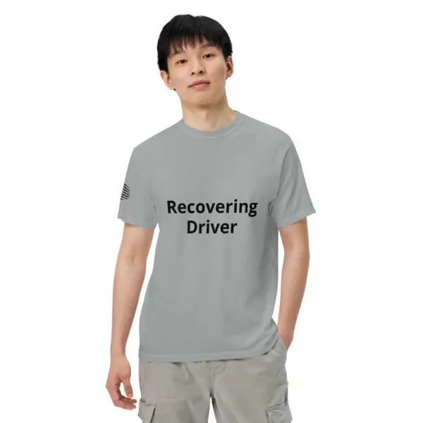 Man wearing a gray "Recovering Driver" t-shirt.