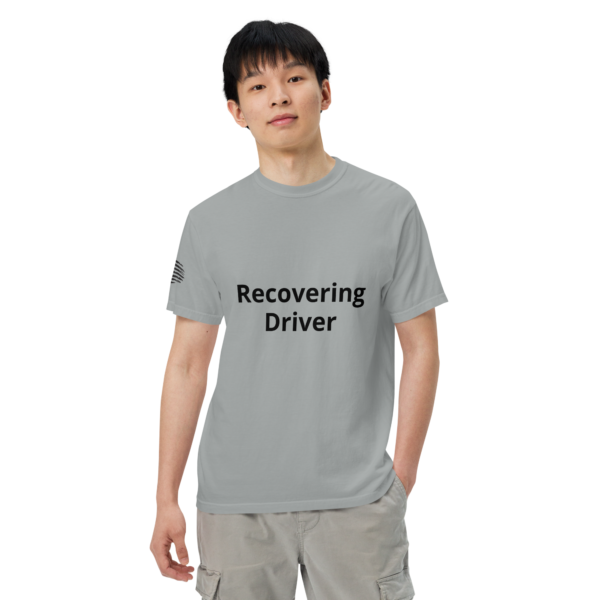 Man wearing a grey "Recovering Driver" t-shirt.