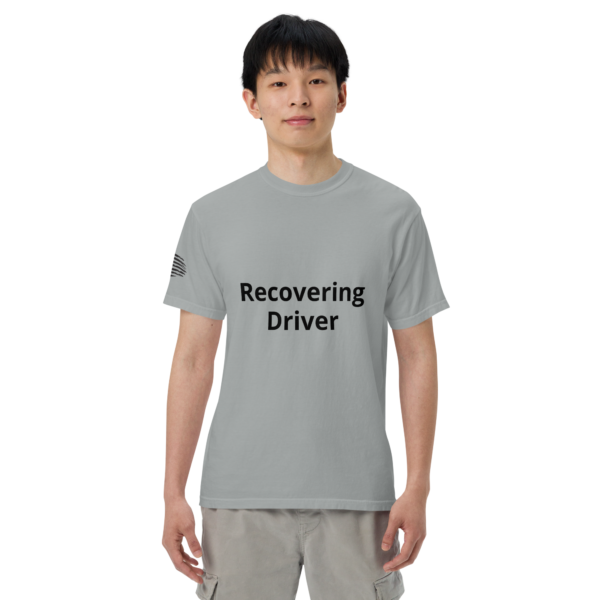 Man wearing a grey "recovering driver" t-shirt.