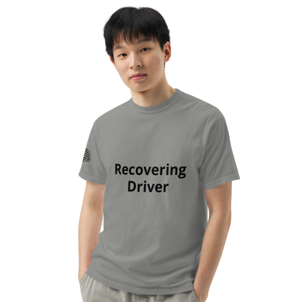 Man wearing a gray t-shirt that says "Recovering Driver".