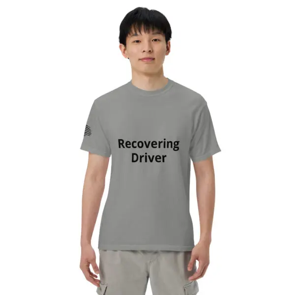 Man wearing a gray "recovering driver" t-shirt.