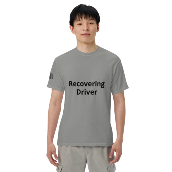 Man wearing a grey "recovering driver" t-shirt.