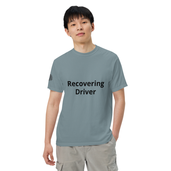 Man wearing a "Recovering Driver" shirt.