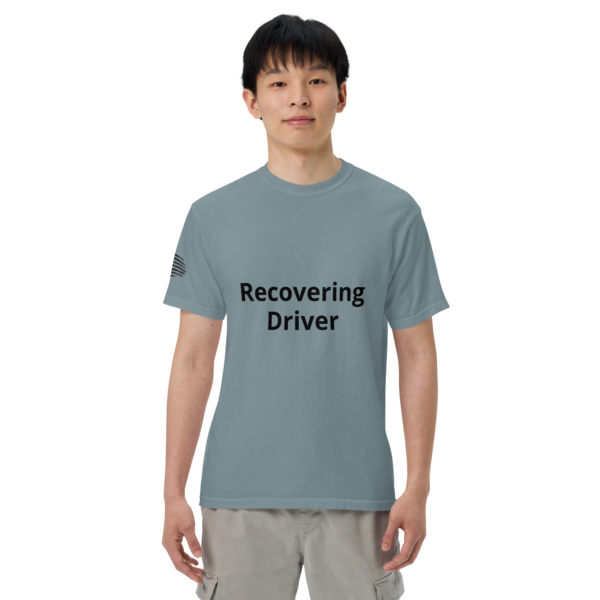 Man wearing a blue "Recovering Driver" shirt.