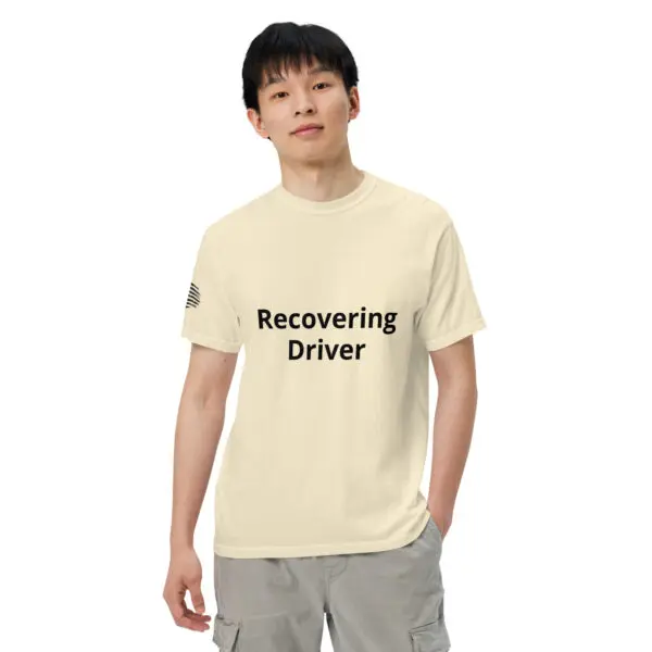 Man wearing a "Recovering Driver" t-shirt.