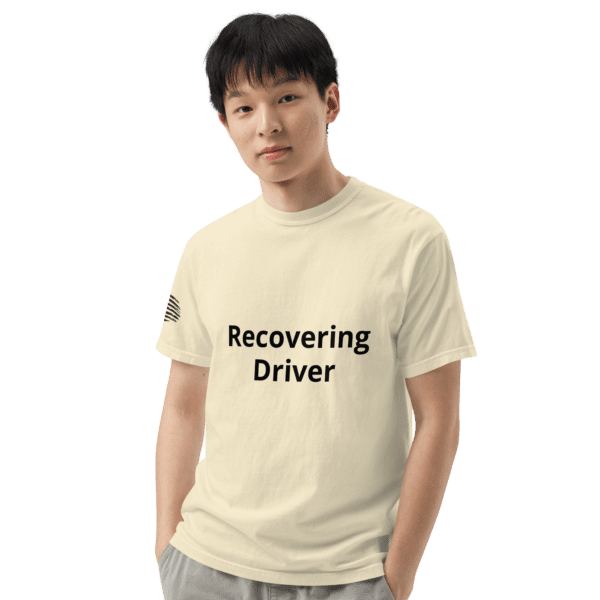 Man in a "recovering driver" t-shirt.