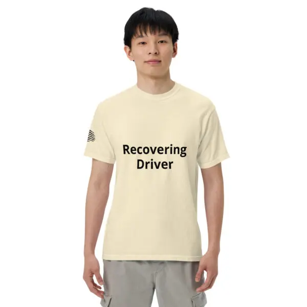 Man wearing a "recovering driver" t-shirt.