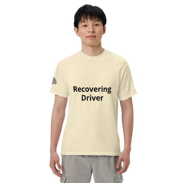 Man wearing a "Recovering Driver" t-shirt.