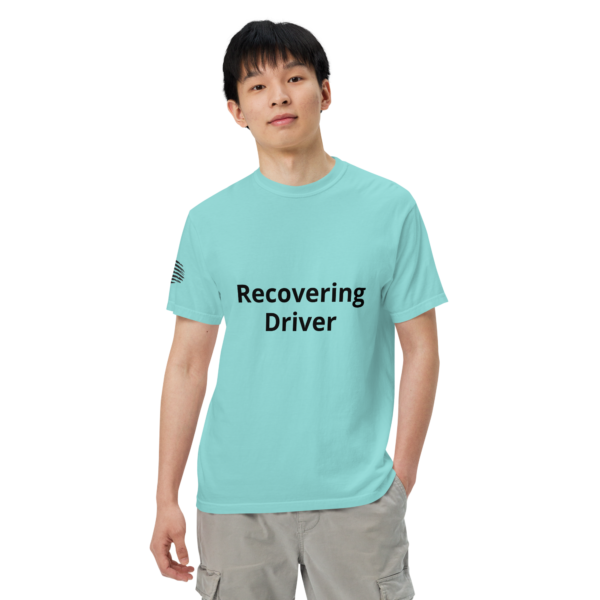 Man wearing a blue "Recovering Driver" shirt.