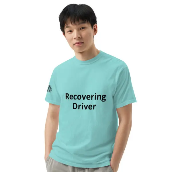 Man wearing a blue "recovering driver" t-shirt.