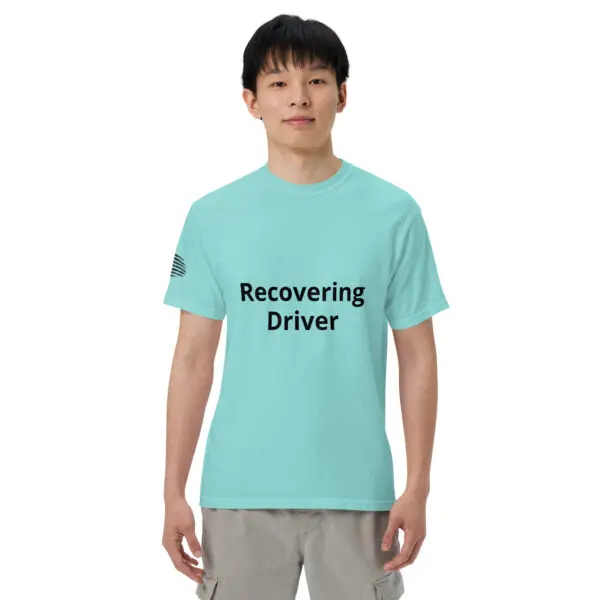 Man wearing a blue "recovering driver" t-shirt.