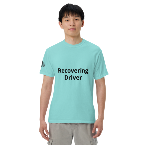 Man wearing a blue "Recovering Driver" T-shirt.