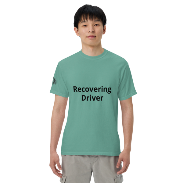 Man wearing a "recovering driver" t-shirt.