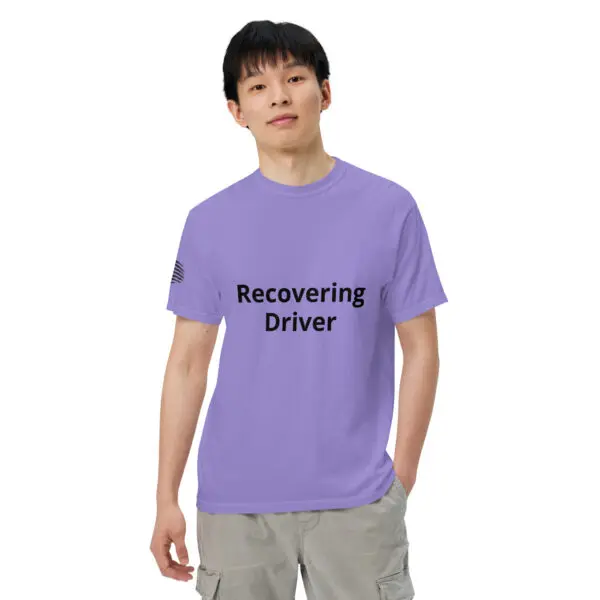 Man wearing a purple "recovering driver" t-shirt.