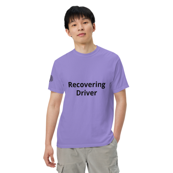 Man wearing a purple "recovering driver" t-shirt.