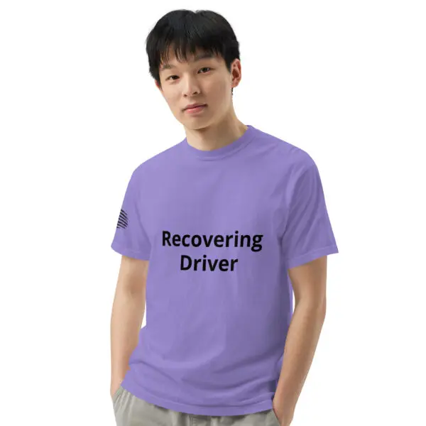 Man wearing a purple "recovering driver" t-shirt.