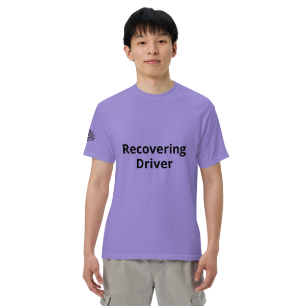 Man wearing a purple "recovering driver" t-shirt.