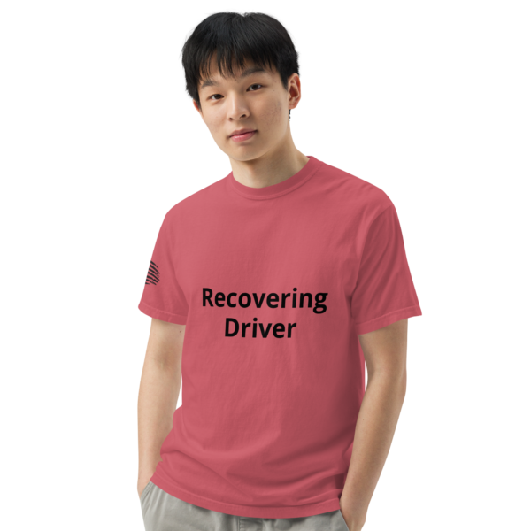 Man wearing a pink "recovering driver" t-shirt.