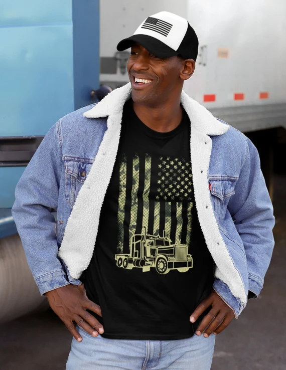 Man wearing a trucker shirt with an American flag.