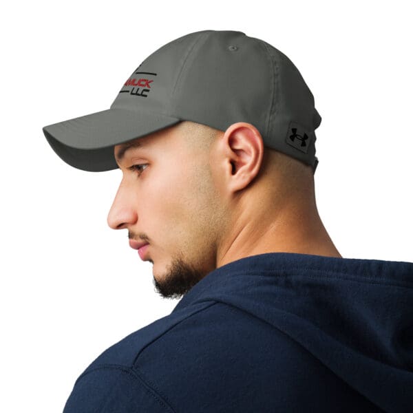 Man wearing a gray Under Armour hat.