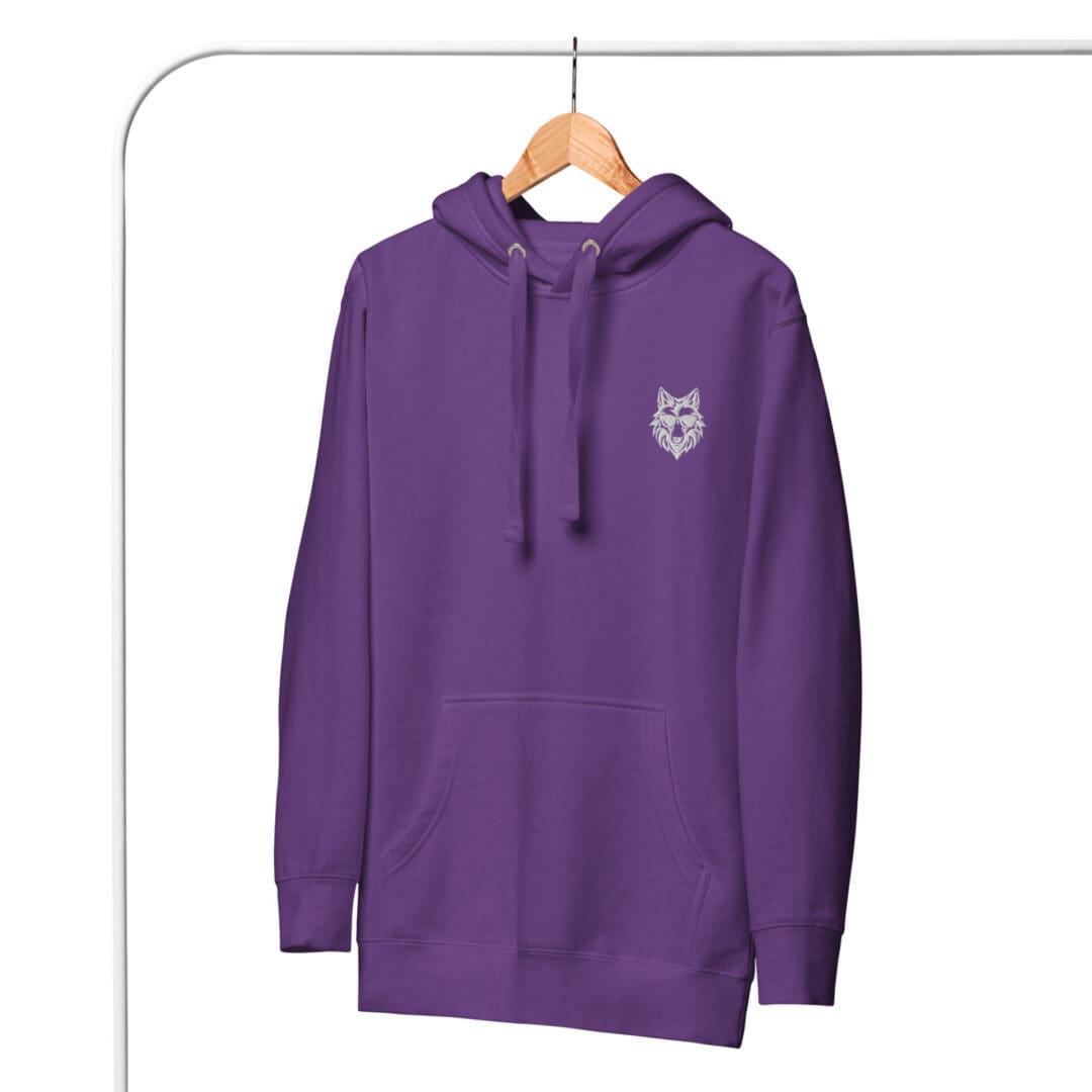 Purple wolf hoodie on a hanger.